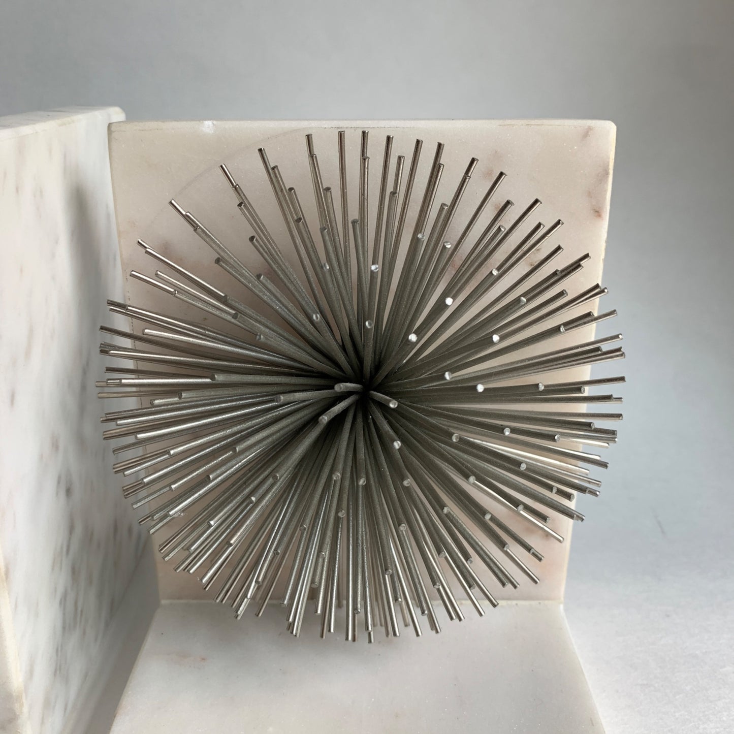 Silver Burst on White Marble Bookends
