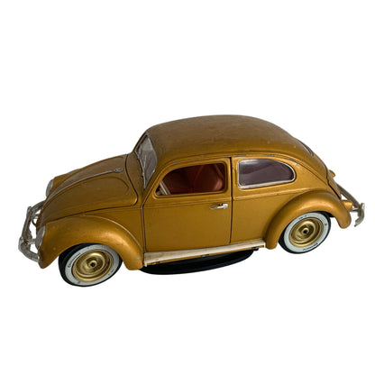 Burago 1955 Gold Volkswagon Beetle Diecast Car with Stand