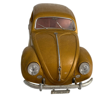 Burago 1955 Gold Volkswagon Beetle Diecast Car with Stand