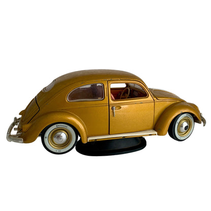 Burago 1955 Gold Volkswagon Beetle Diecast Car with Stand