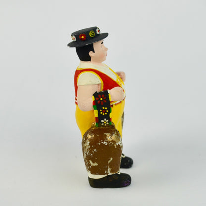 Hand-Painted Ceramic Farmer Figurine In Traditional Outfit Holding Milk Cans