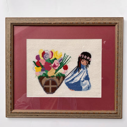 1970’s Framed De Grazia Needlepoint Native Girl with Basket of Flowers 18 x 15.25"