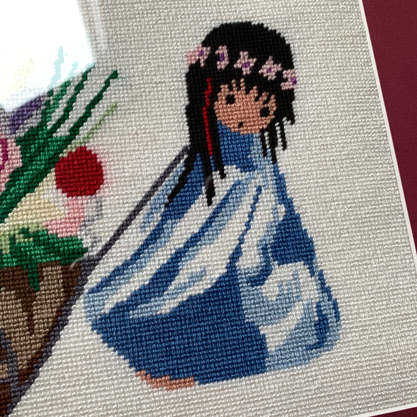 1970’s Framed De Grazia Needlepoint Native Girl with Basket of Flowers 18 x 15.25"