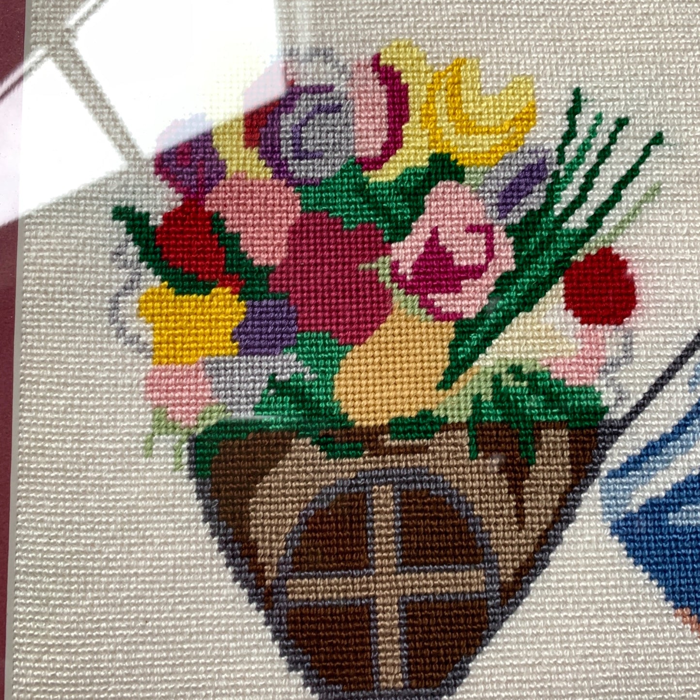 1970’s Framed De Grazia Needlepoint Native Girl with Basket of Flowers 18 x 15.25"