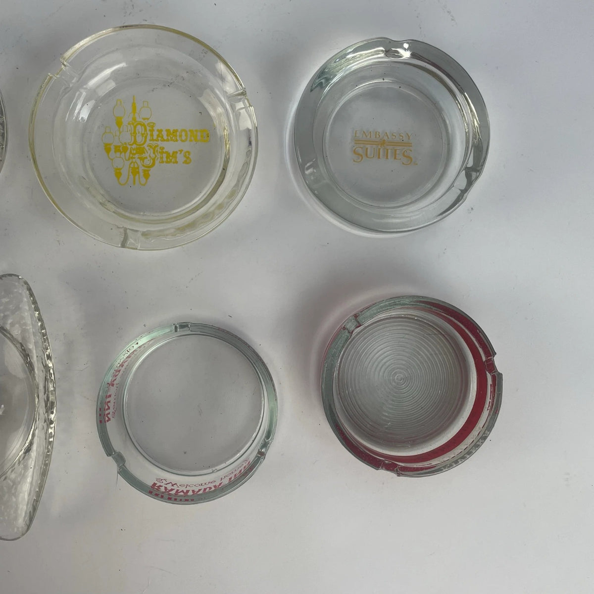 Lot of 8 Vintage Hotel Travel Ashtrays Glass