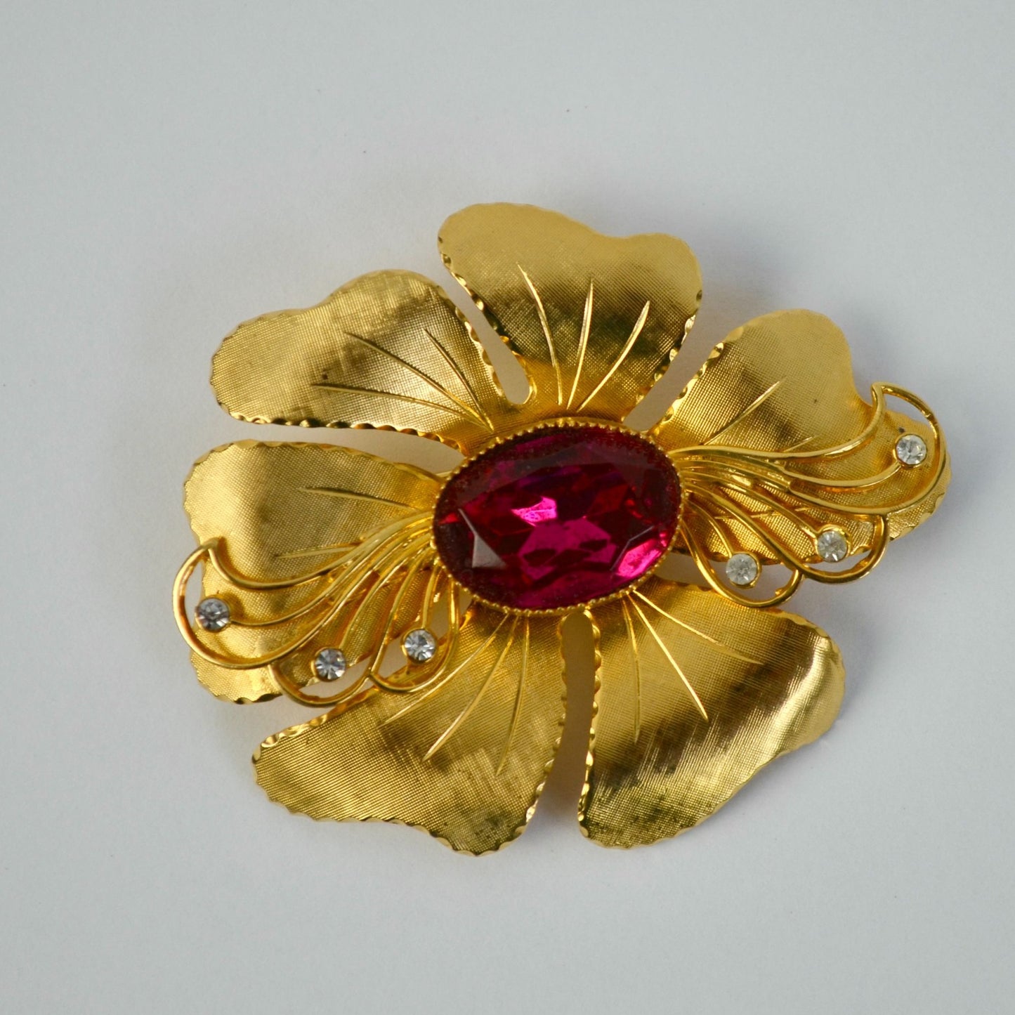 Vintage Textured Polished Gold Tone Red/Pink Rhinestone CZ Brooch