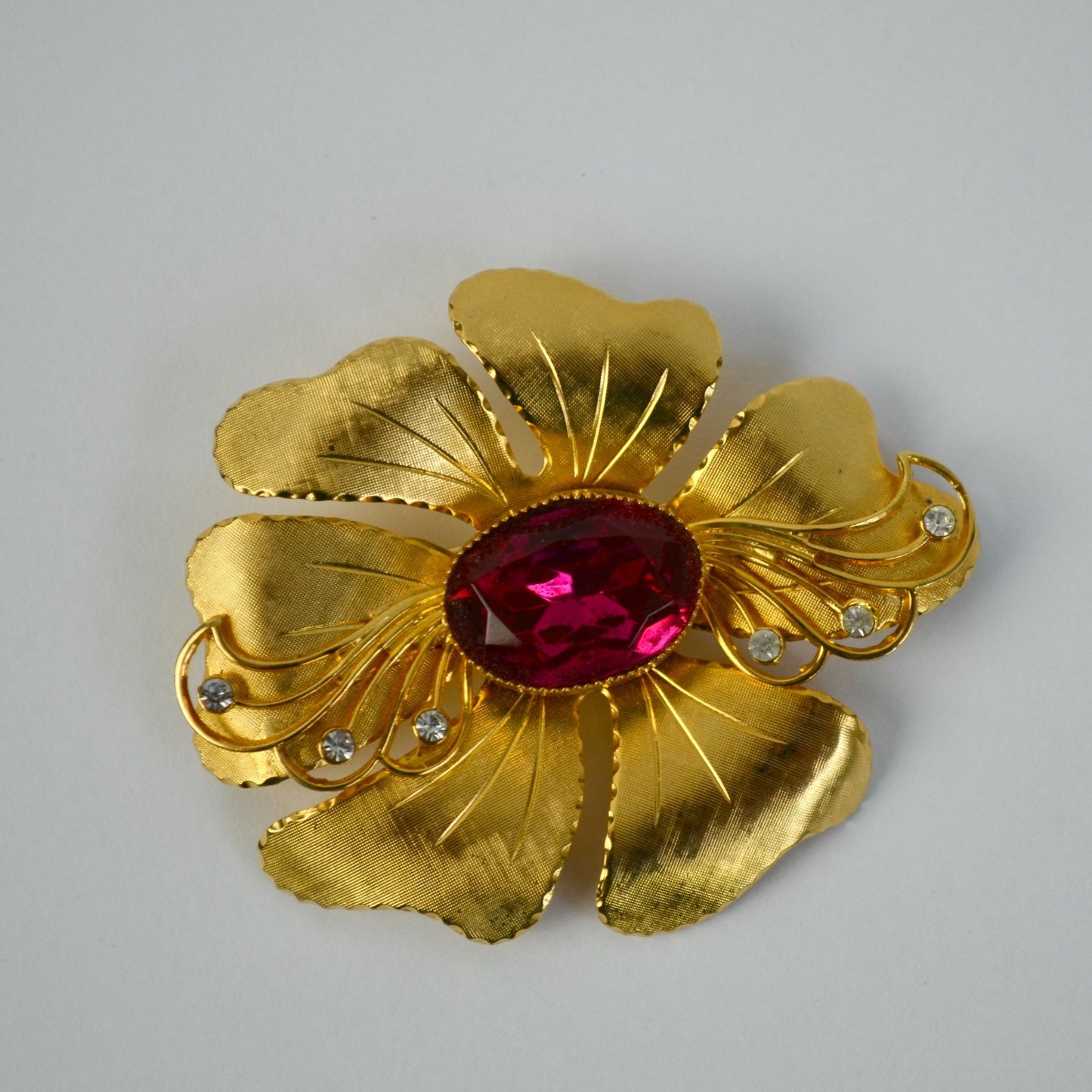 Vintage Textured Polished Gold Tone Red/Pink Rhinestone CZ Brooch