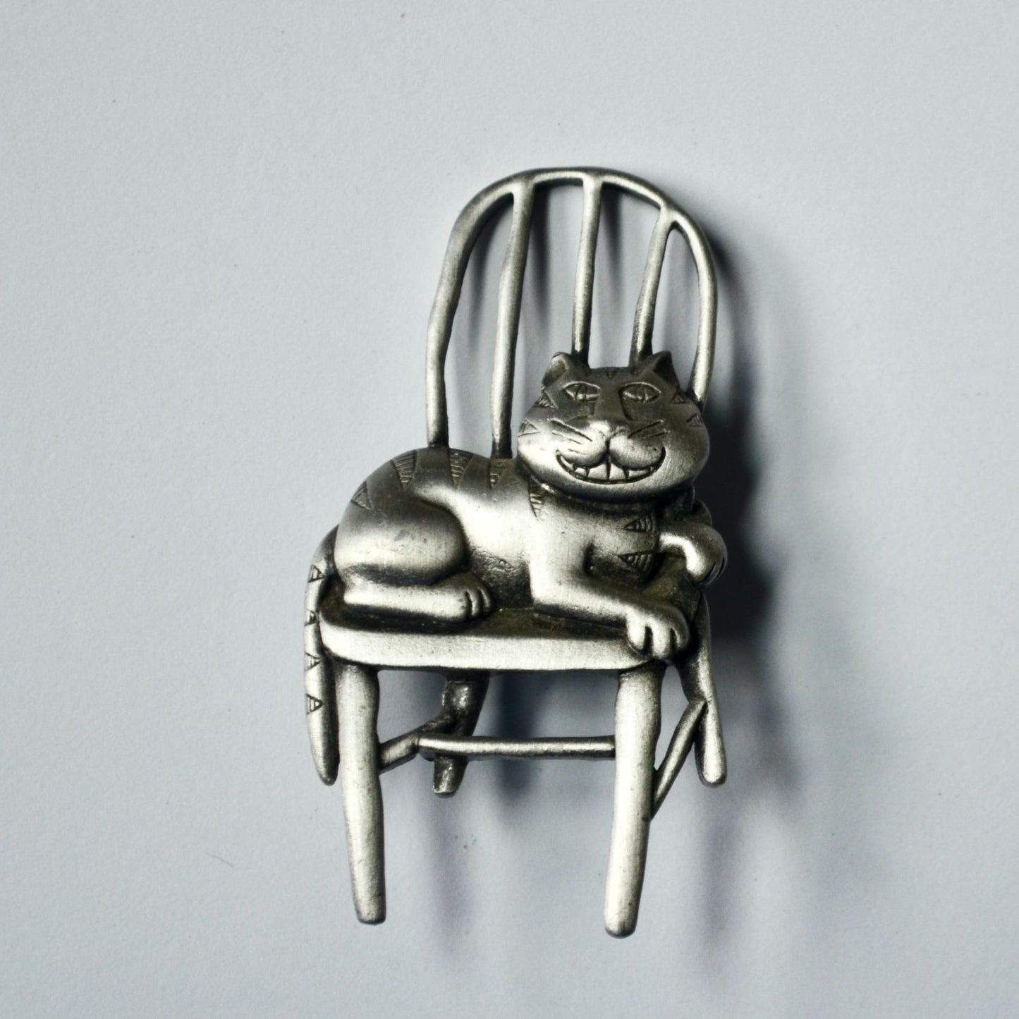 JJ Jonette Smiling Cat on Chair Brooch Silver Vintage