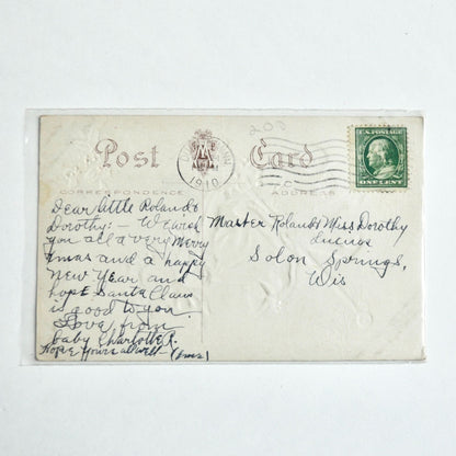 1910 Antique Christmas Postcard Greetings Curly Haired Girl on Toy Horse