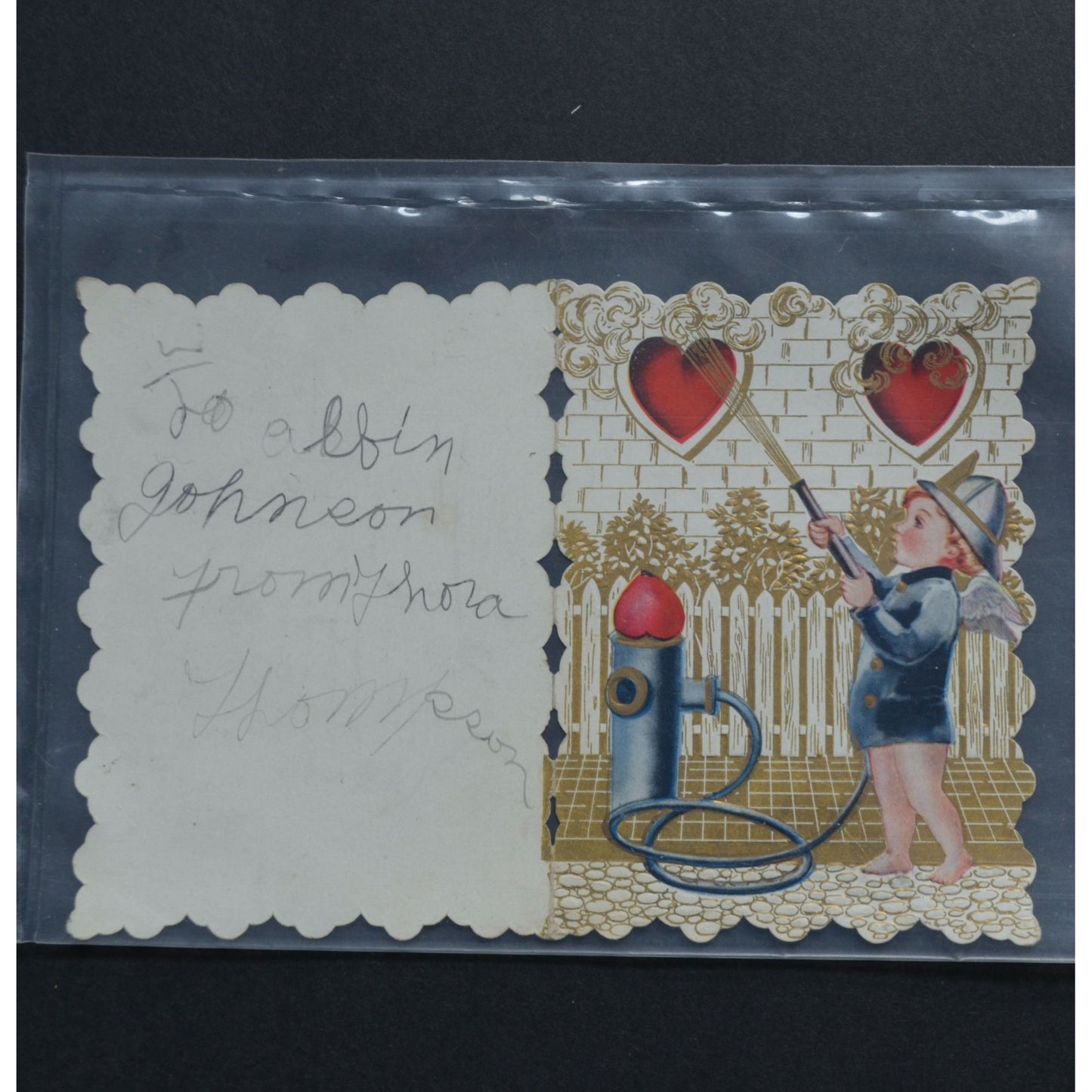 Vintage Valentine's Day Card Die Cut Boy Fire Hose Fireman Cherub