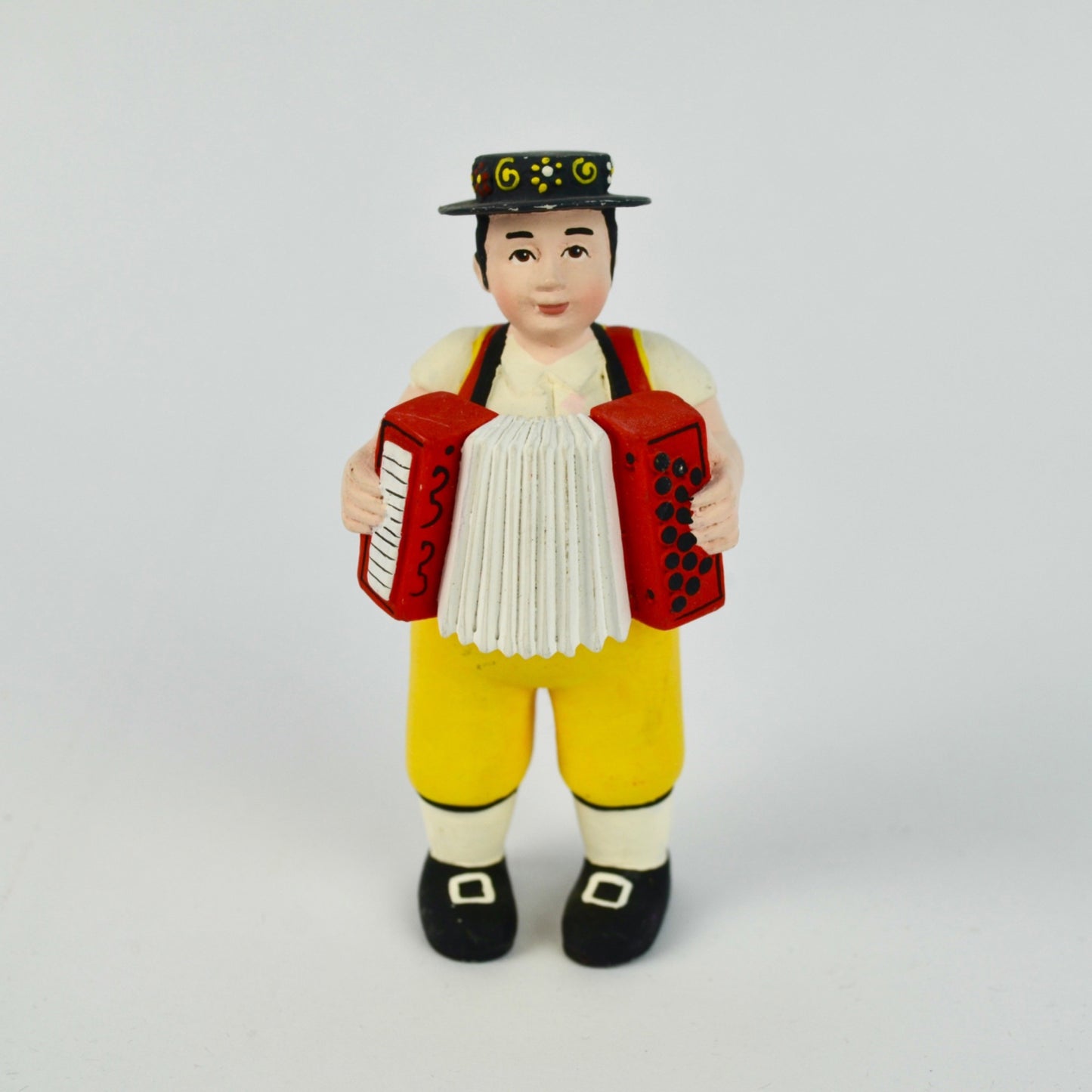 Hand-Painted Folk Musician Figurine With Accordion & Traditional Outfit