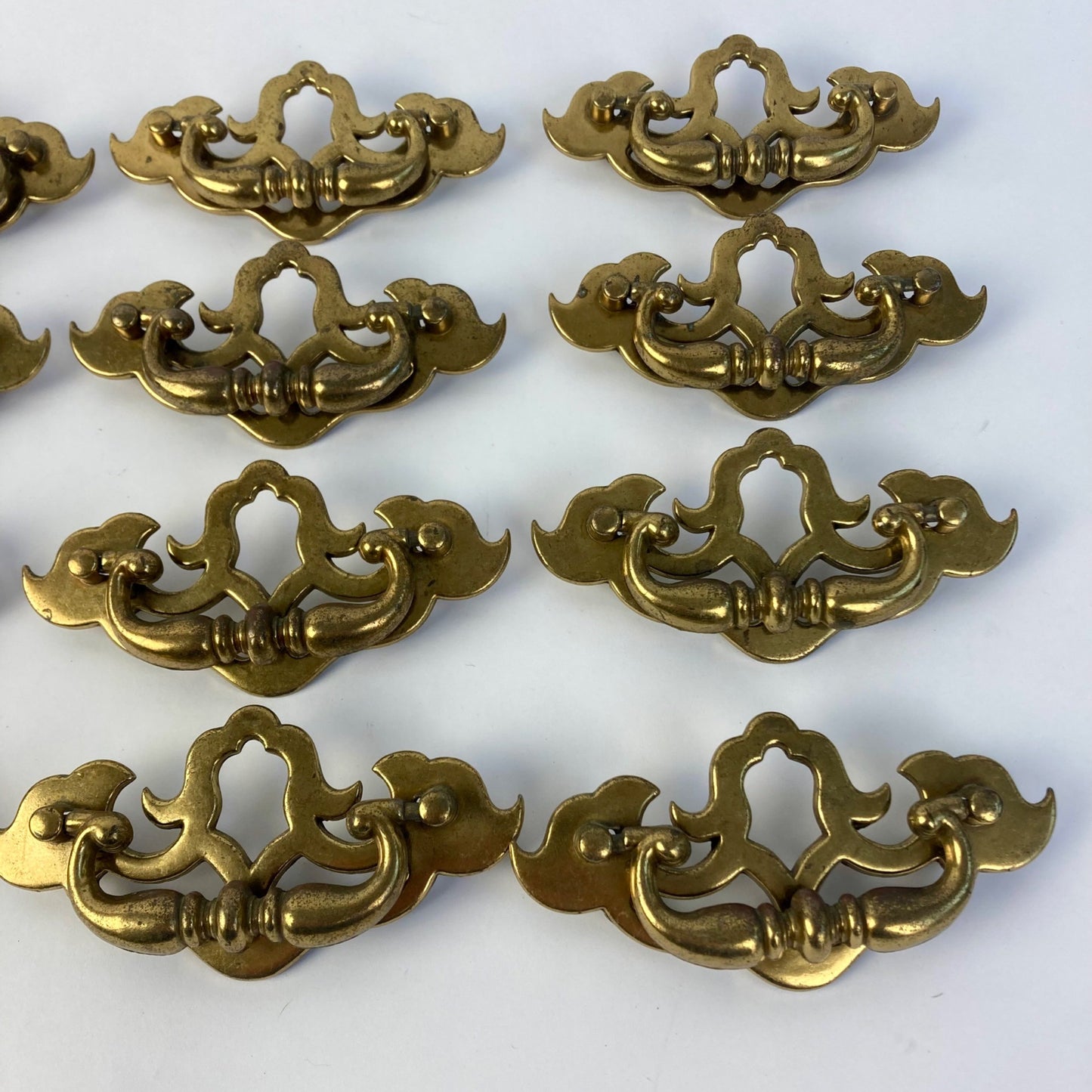 Lot of 12 Vintage Gilded Brass Drawer Pulls 657 Batwing Drop Bail